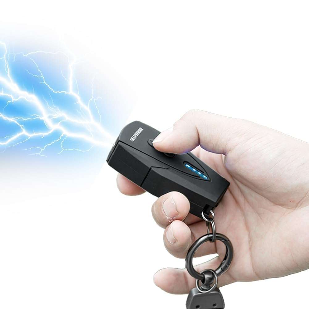 Selfstrike Mini Stun Gun with LED Flashlight and Wrist Strap – Unique Key Chain Design – Using Anti Slip Materials can Better and Faster aim with Charging Cable,mini Screwdriver and User Manual - Image 4