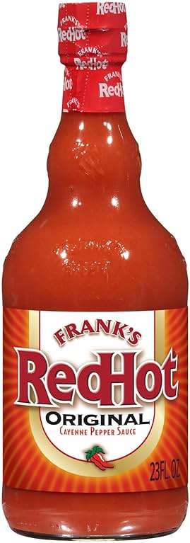 Frank's RedHot Hot Sauce, Original, Made with Cayenne Peppers, Ready-To-Use, Shake or Pour Over Chicken Wings, Sandwiches, Pizza, and More for the Perfect Bend of Flavor and Heat, 23 fl oz - Image 1