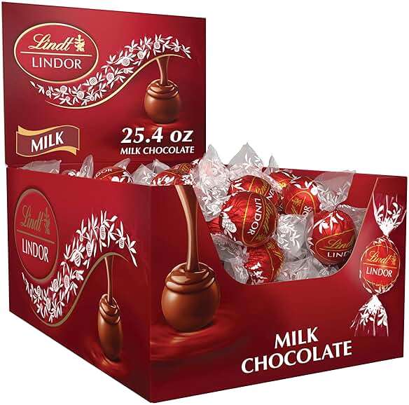 Lindt LINDOR Milk Chocolate Candy Truffles, Milk Chocolate with Smooth, Melting Truffle Center, 25.4 oz., 60 Count - Image 1