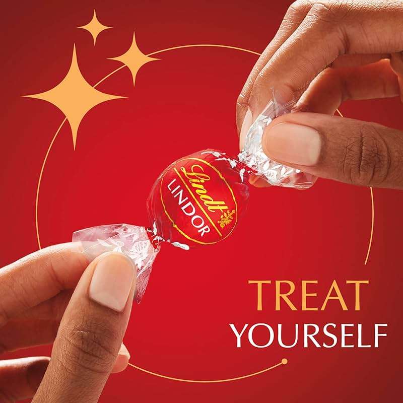 Lindt LINDOR Milk Chocolate Candy Truffles, Milk Chocolate with Smooth, Melting Truffle Center, 25.4 oz., 60 Count - Image 5