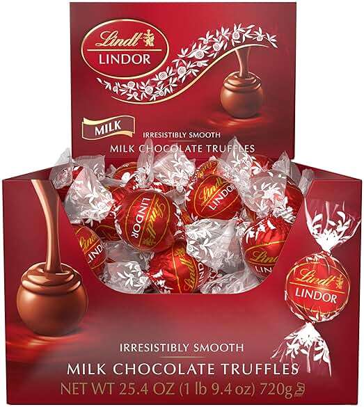 Lindt LINDOR Milk Chocolate Candy Truffles, Milk Chocolate with Smooth, Melting Truffle Center, 25.4 oz., 60 Count - Image 7