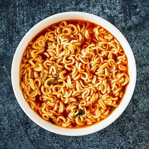 Nongshim Shin Ramyun Noodles, Spicy Korean Signature Instant Ramyun, Rich Beef Flavored Broth, Microwaveable, Korean Instant Noodles, 4.23 oz (Pack of 20), Packaging May Vary. - Image 5