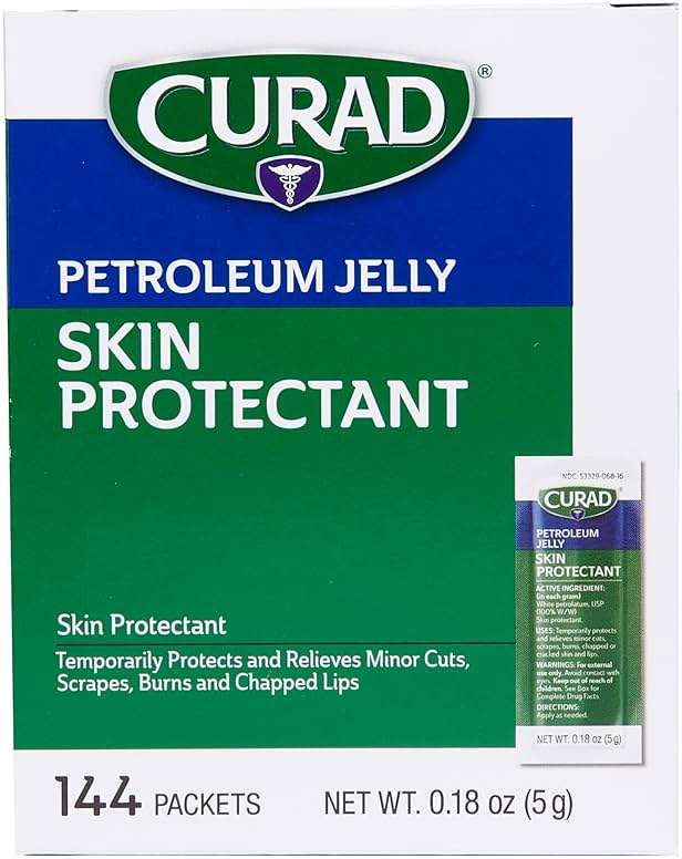 CURAD Petroleum Jelly Skin Protectant, Healing Ointment for Dry Cracked Skin, 144 Count Packets - Image 1