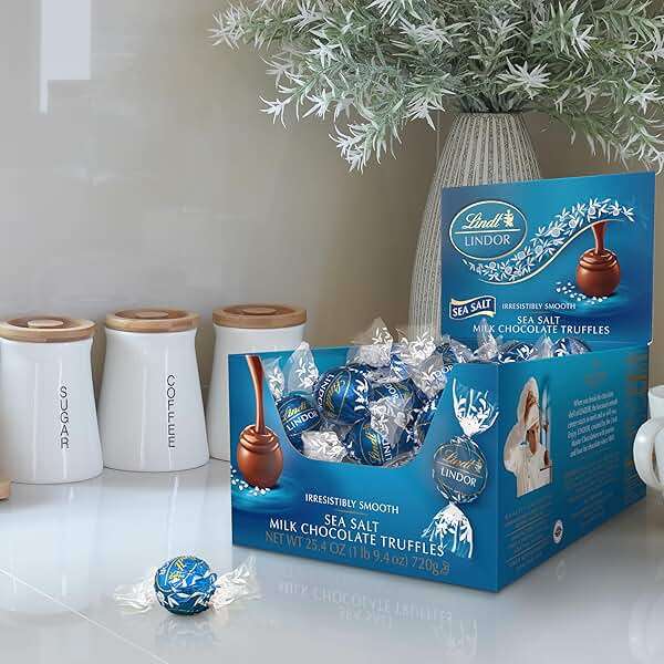 Lindt LINDOR Sea Salt Milk Chocolate Truffles, Milk Chocolate Candy with Smooth, Melting Truffle Center, 25.4 oz, 60 Count - Image 2