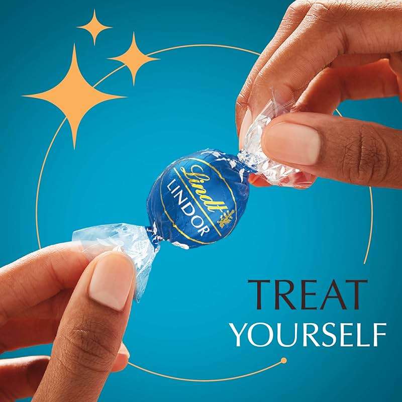 Lindt LINDOR Sea Salt Milk Chocolate Truffles, Milk Chocolate Candy with Smooth, Melting Truffle Center, 25.4 oz, 60 Count - Image 5