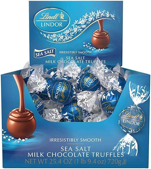 Lindt LINDOR Sea Salt Milk Chocolate Truffles, Milk Chocolate Candy with Smooth, Melting Truffle Center, 25.4 oz, 60 Count - Image 7