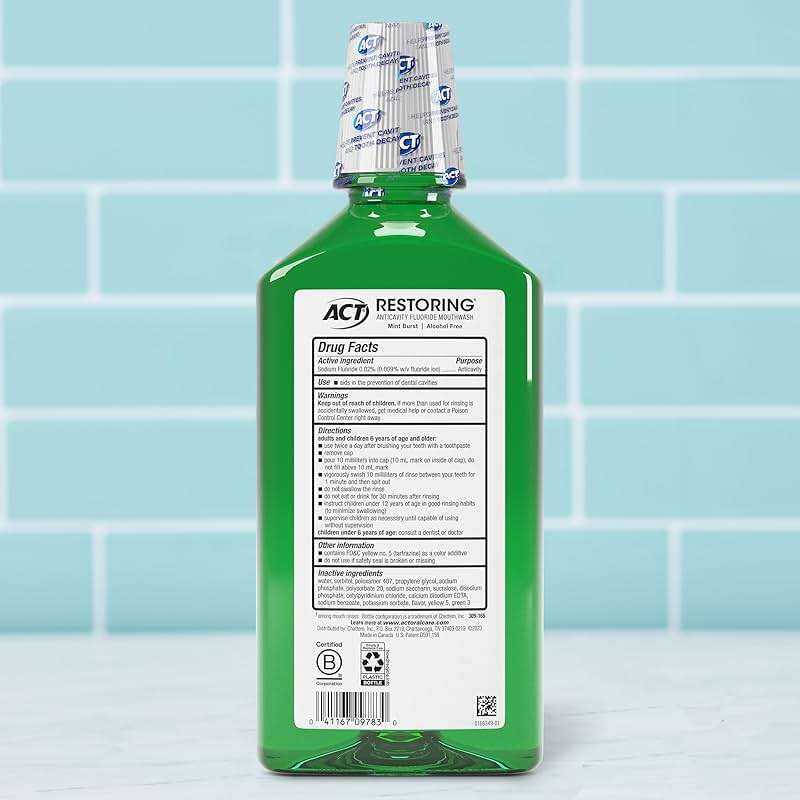 ACT Restoring Zero Alcohol Fluoride Mouthwash 33.8 fl. oz. Strengthens Tooth Enamel, Mint Burst - Image 2