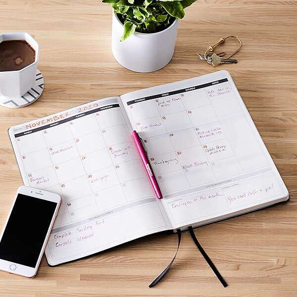 Amazon Basics Daily Planner and Journal, Weekly and Monthly, Undated, Productivity Organization with Goals, Hardcover, 5.8" x 8.25", Black - Image 2
