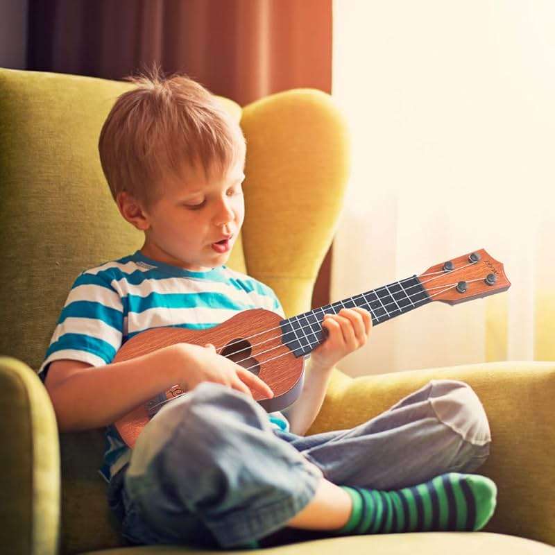 YEZI Classical Ukulele for Kids, Mini Toddler Guitar Toy with Pick, Educational Musical Instrument for Preschool Boys Girls, Early Learning Music Toy for Ages 3 4 5 6+ Years Old, Brown - Image 2