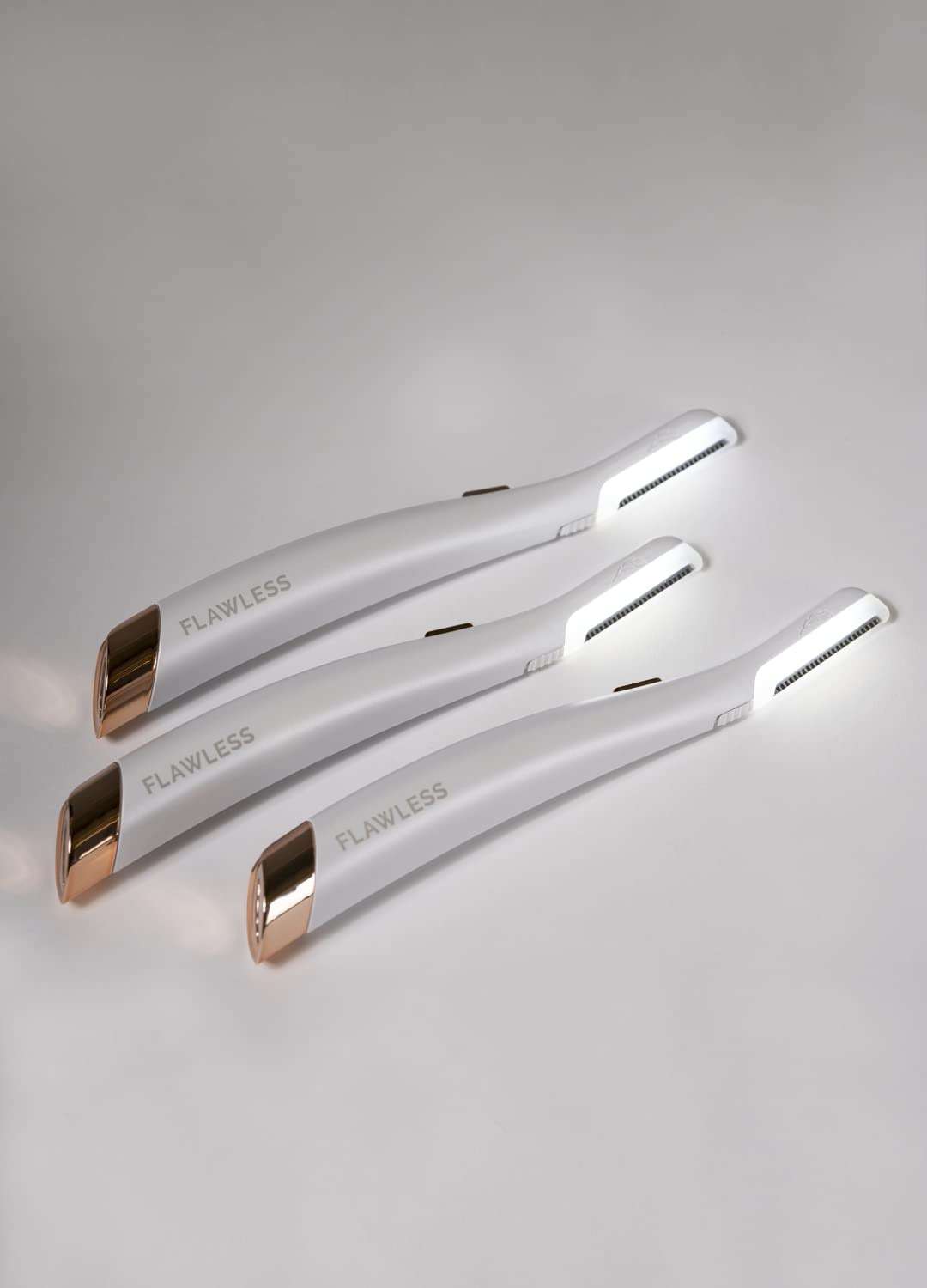 Finishing Touch Flawless Dermaplane Glo Lighted Facial Exfoliator - Non-Vibrating and Includes 6 Replacement Heads, White/Rose Gold - Image 6