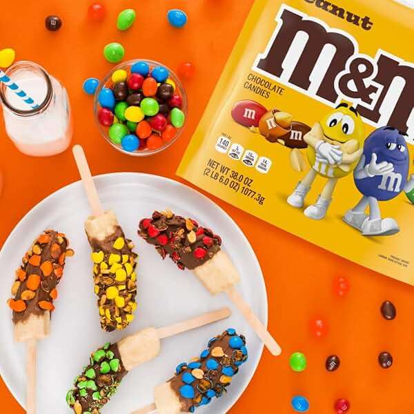 M&M'S Peanut Milk Chocolate Candy Resealable Bulk Pack, Party Size, 38 oz Bag, For Sharing, Baking and Snacking - Image 7