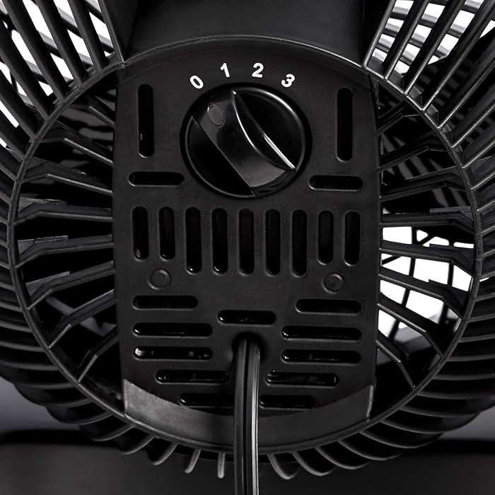 Amazon Basics Air Circulator Desk Fan for Bedroom, Home and Office, 90-Degree Tilt Head, 3 Speed Settings, Cooling, 35 Watts, Black, 11.1"W x 6.3"D x 10.9"H - Image 5