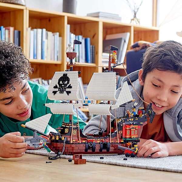 LEGO Creator 3 in 1 Pirate Ship Building Set, Kids can Rebuild The Pirate Ship into an Inn or Skull Island, Features 4 Minifigures and Shark Toy, Makes a Great Gift for Kids Ages 9+ Years Old, 31109 - Image 6