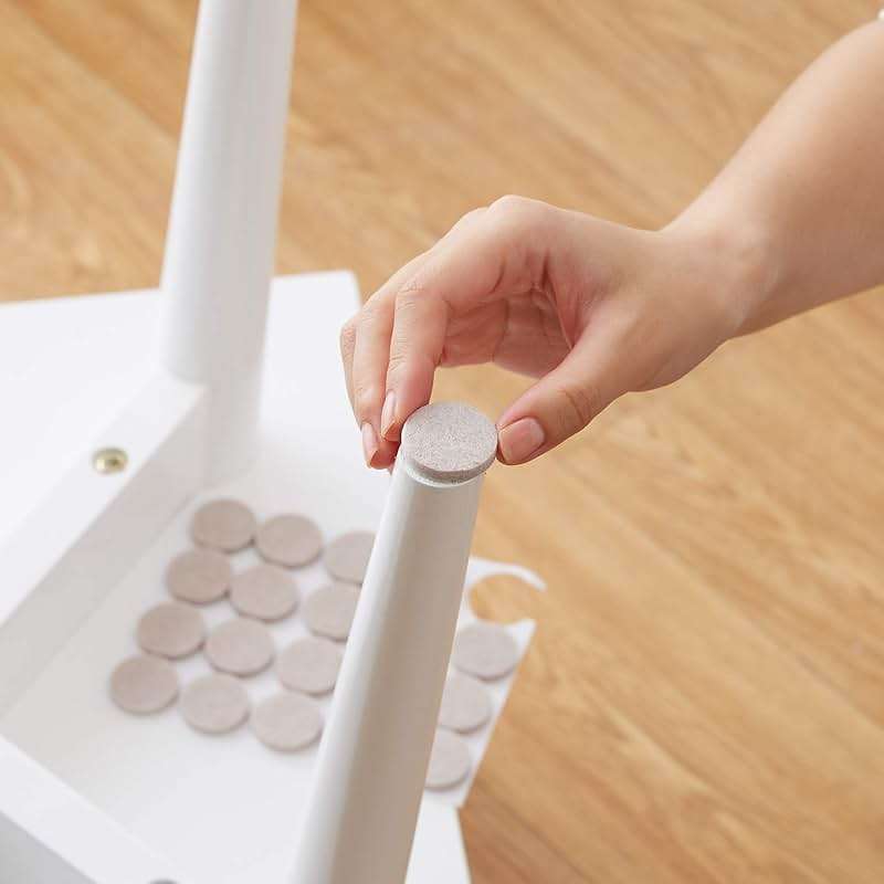 Amazon Basics Round Self Adhesive Felt Furniture Pads, Floor Protectors, Anti Scratch, 1 inch, 32 Count, Beige - Image 5