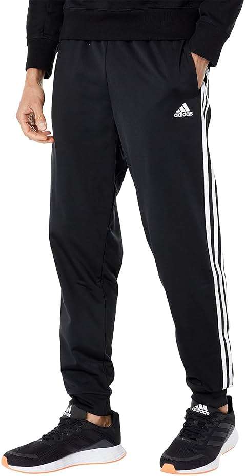 adidas Men's Essentials Warm-up Tapered 3-Stripes Track Pants - Image 1