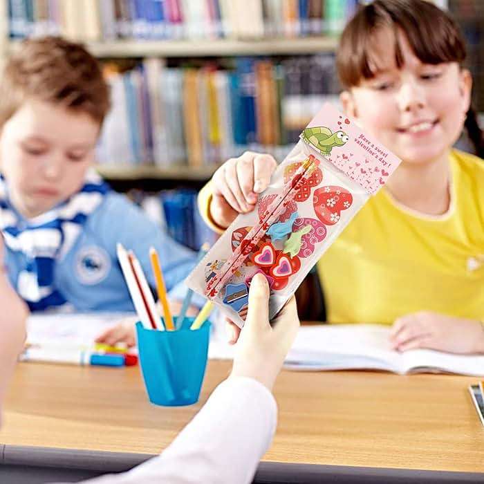 Valentine's Day Gifts for Kids Classroom - 28 Packs Super Value Stationery Kit, Cards, Pencils, Erasers, Pen Sharpeners, Holders, Exchange Party Favors Toys - Image 7