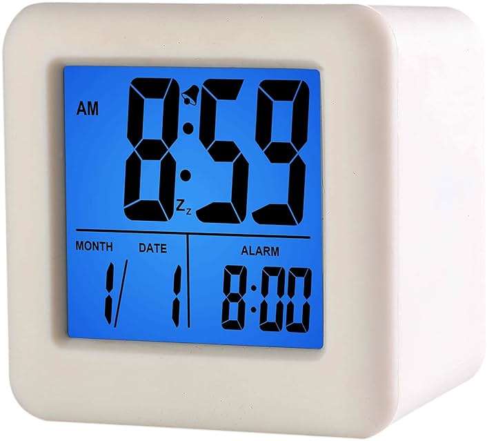 Plumeet Easy to Set Digital Travel Alarm Clock, Snooze Function, Soft Night Light, Large Screen time and Month and Date Display and Alarm, Progressive Sound Alarm and Handy Size (White) - Image 1