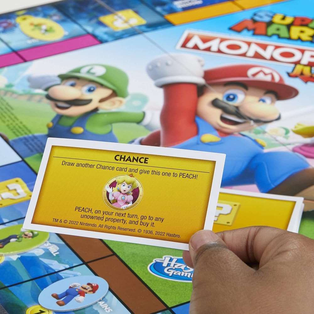 Monopoly Junior Super Mario Edition Board Game, Fun Kids' Ages 5 and Up, Explore The Mushroom Kingdom as Mario, Peach, Yoshi, or Luigi (Amazon Exclusive) - Image 4