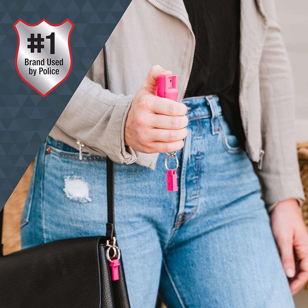 SABRE Pepper Spray And 2-in-1 Stun Gun and Flashlight, 25 Bursts of Max Strength OC Spray, Intuitive Finger Grip, 0.54 fl oz, Painful 1.160 µC Charge, 120 Lumens, Rechargeable, Safety Switch, Holster - Image 4