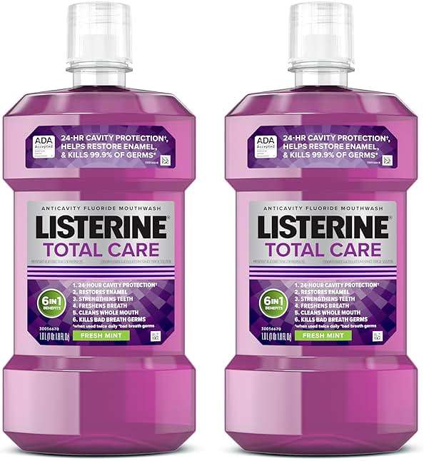 Listerine Mouthwash Total Care Anti Cavity Treatment for Adults Kills 99.9% of Bad Breath Germs in Intense Mint Antibacterial Fluoride Mouthwash, 2 pack of 33.8 fl oz​ - Image 1
