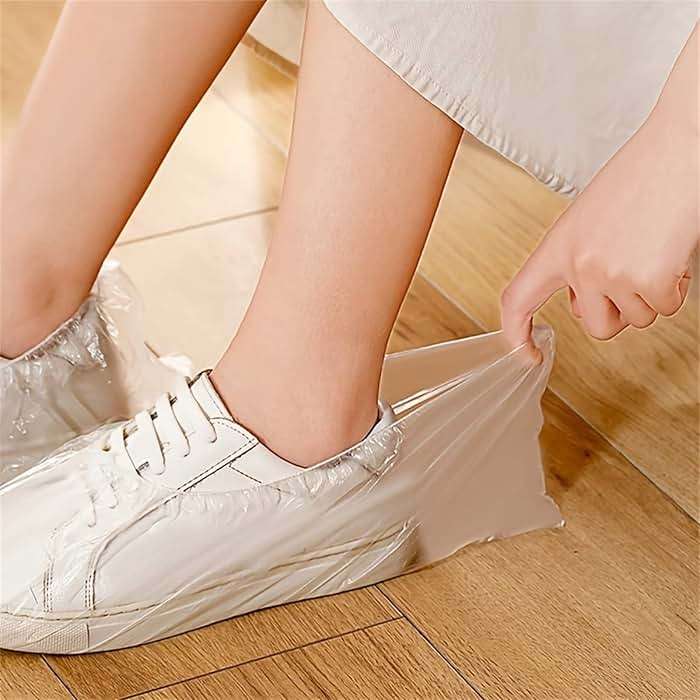 Typutomi Disposable Shoe Covers Waterproof,100pcs(50 Pairs) Clear Shoe Protectors Covers Non Slip Household Indoor Thickened Foot Covers - Fits Most Shoes - Image 1