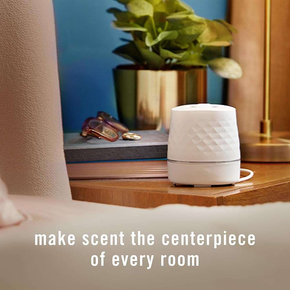 Febreze Plug Scent Booster Starter Kit – Air Freshener, Oil Diffuser, Continuous Scent Device, Includes 2 Gain Refills - Image 9