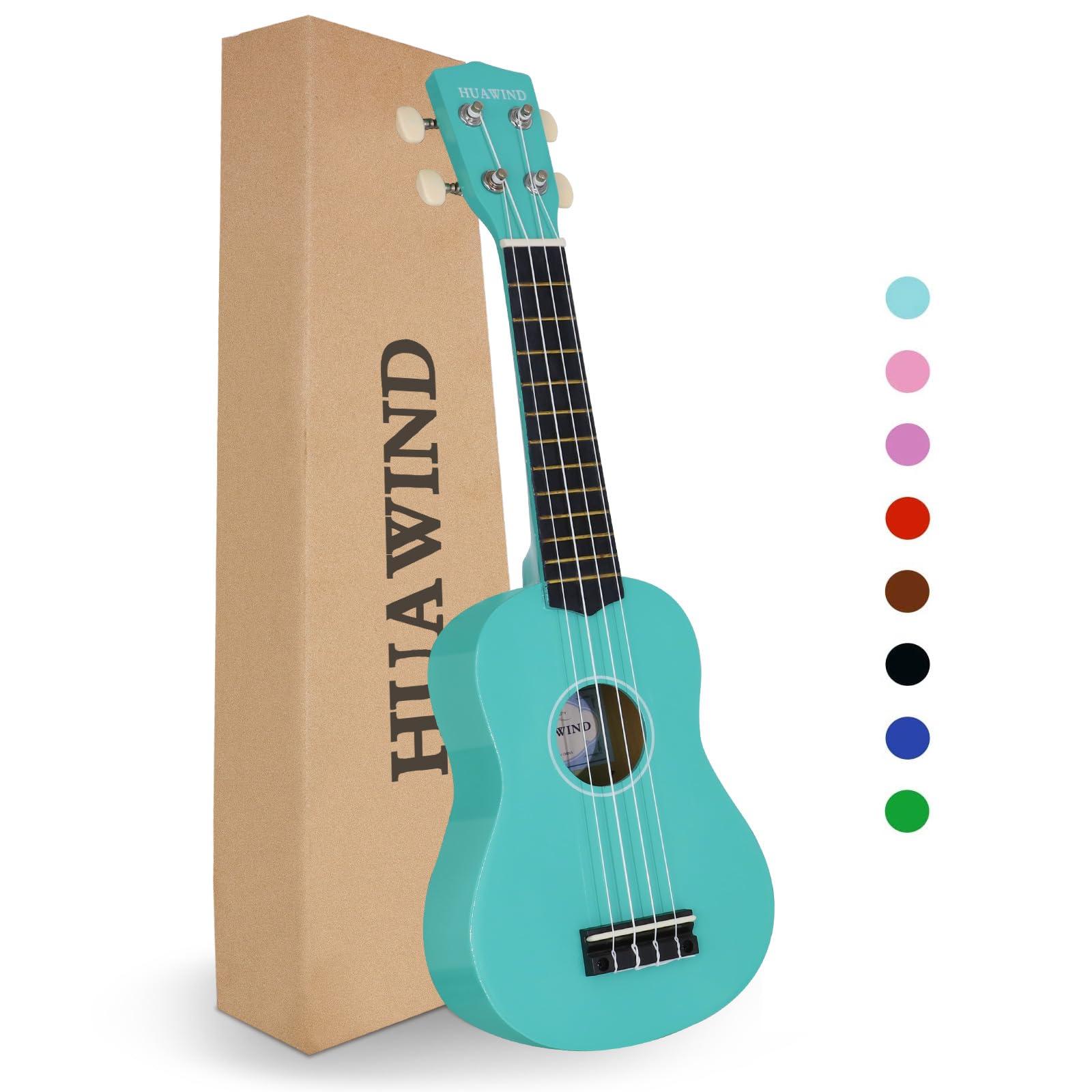 HUAWIND Soprano Ukulele For Beginners Four String Hawaiian Ukelele Start Pack Light Blue Ukelele