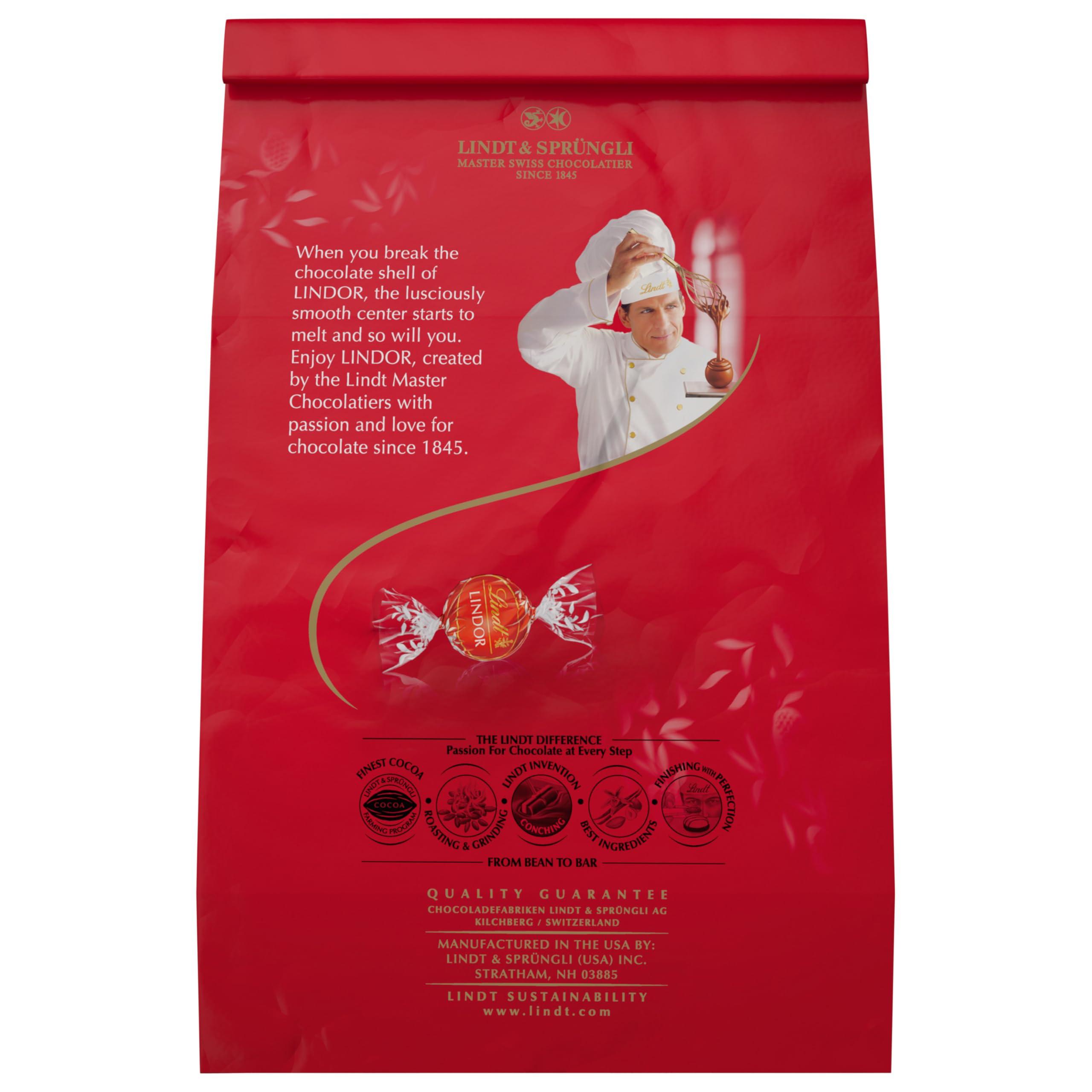 Lindt LINDOR Milk Chocolate Candy Truffles, Milk Chocolate with Melting Truffle Center, 15.2 oz. Bag - Image 8