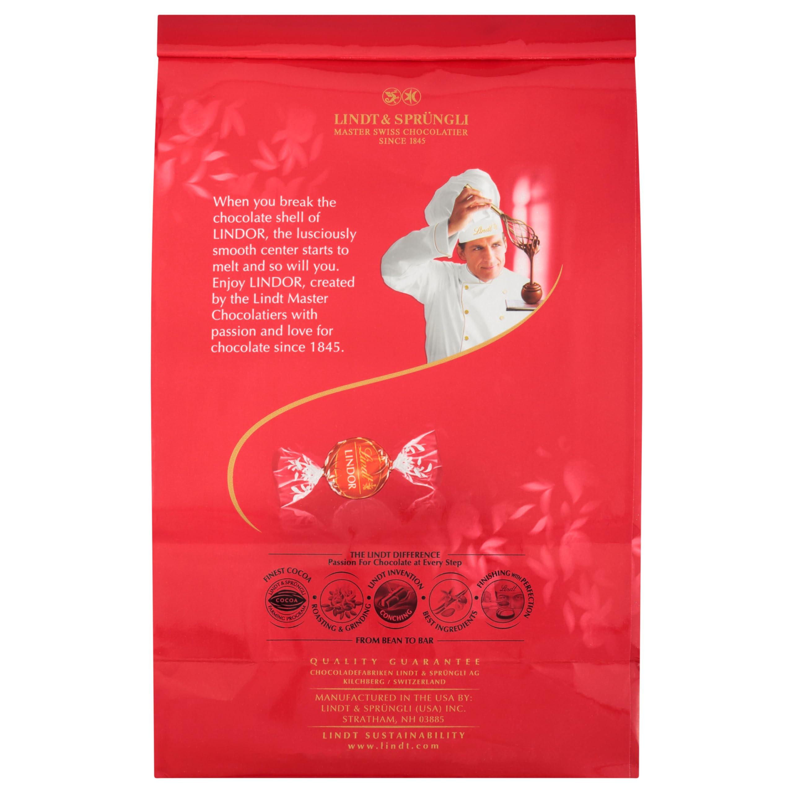 Lindt LINDOR Milk Chocolate Candy Truffles, Milk Chocolate with Melting Truffle Center, 15.2 oz. Bag - Image 9