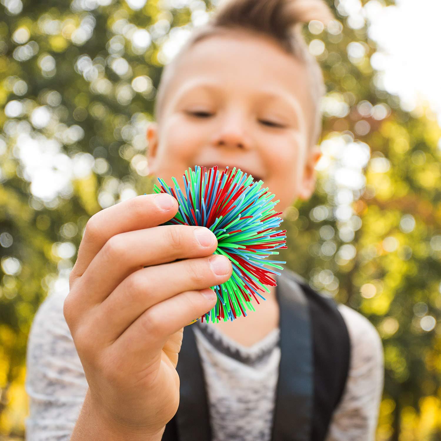 Leinuosen 12 Pieces Monkey Stringy Balls Sensory Stringy Ball Soft Rainbow Pom Bouncy Stress Bags Stuffers Party Favors Birthday Gifts, Multicolor (2.75 Inch) - Image 5