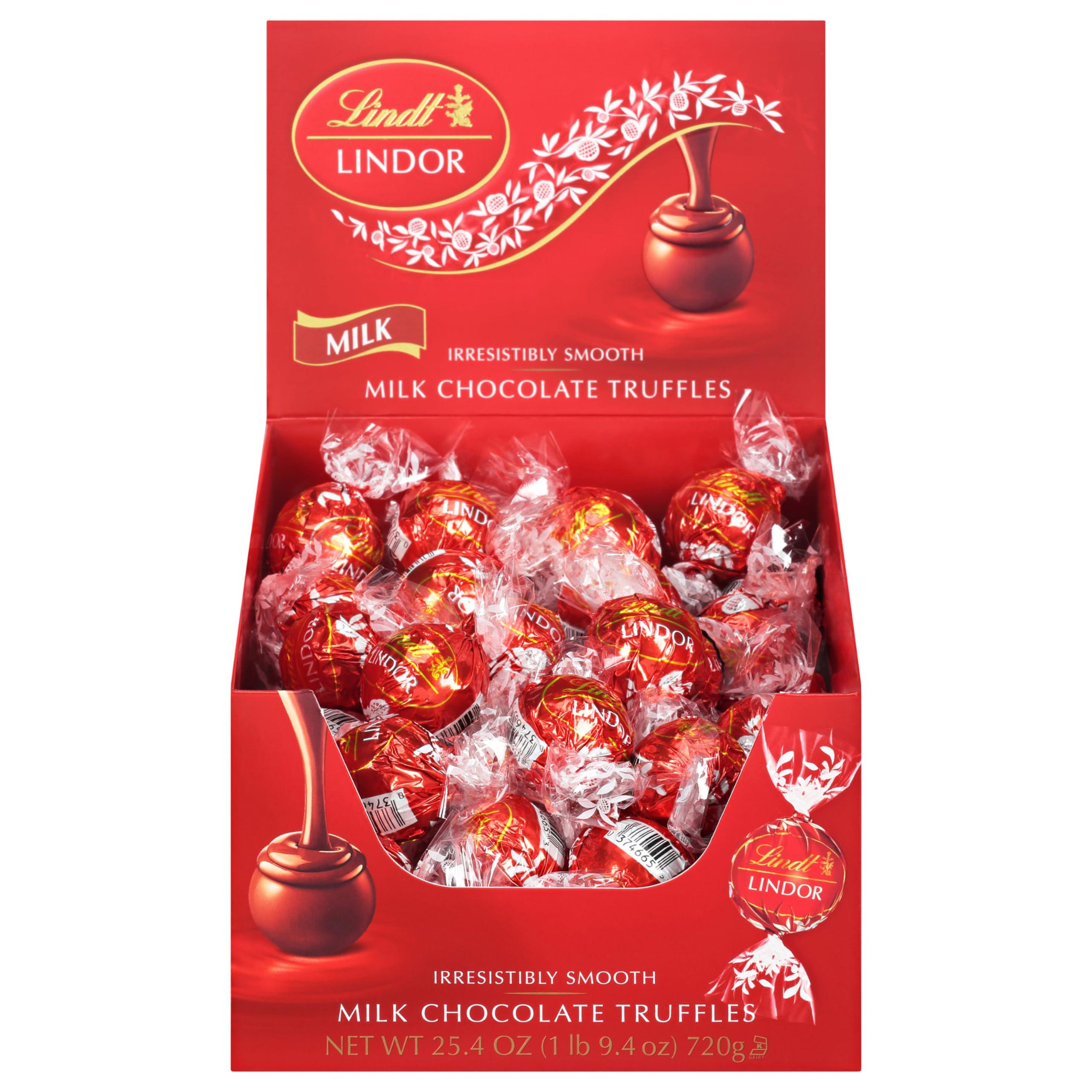 Lindt LINDOR Milk Chocolate Candy Truffles, Milk Chocolate with Smooth, Melting Truffle Center, 25.4 oz., 60 Count - Image 8