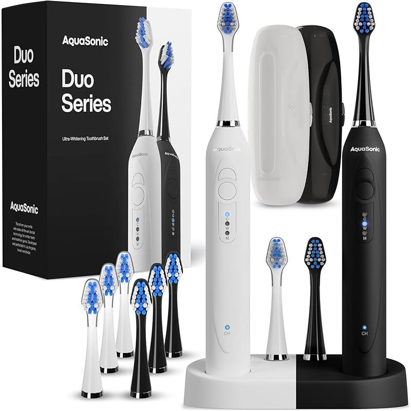 Aquasonic Duo - Dual Handle Ultra Whitening 40,000 VPM Wireless Charging Electric ToothBrushes - 3 Modes with Smart Timers - 10 Dupont Brush Heads & 2 Travel Cases Included by Aquasonic — Shop at Bazar