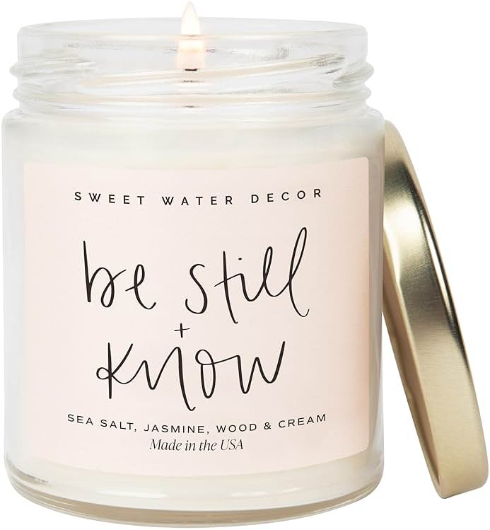 Sweet Water Decor, Be Still and Know, Sea Salt, Jasmine, Cream, and Wood Scented Soy Wax Candle for Home - Christian Candle Gifts for Women - 9oz Clear Jar, 40 Hour Burn Time, Made in the USA - Product Image