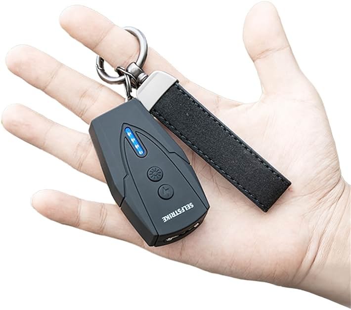 Selfstrike Mini Stun Gun with LED Flashlight and Wrist Strap – Unique Key Chain Design – Using Anti Slip Materials can Better and Faster aim with Charging Cable,mini Screwdriver and User Manual - Product Image