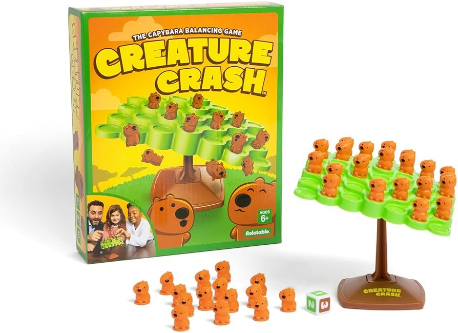 Creature Crash by Relatable, The Capybara Balancing Game, Great Kids Games and Family Game Night Essentials, Includes 49 Capybaras, 1 Balancing Board, 1 Pillar Base, 1 Die, and Instructions - Product Image