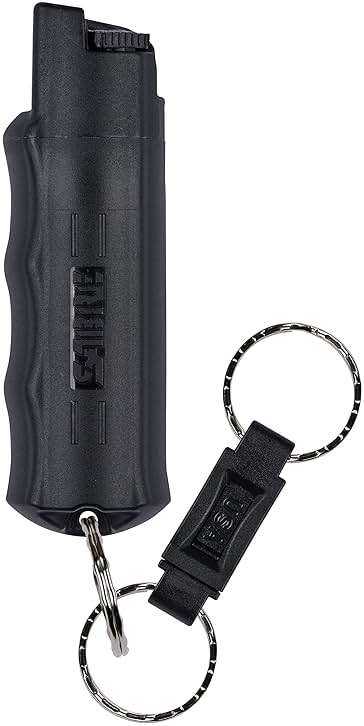 SABRE Pepper Spray with Quick Release Keychain for Self Defense – Maximum Strength OC Spray with UV Marking Dye, Twist Lock Safety, Finger Grip, 10‑Second Spray, 14‑ft Range, Made in USA, 0.54 fl oz - Image 1