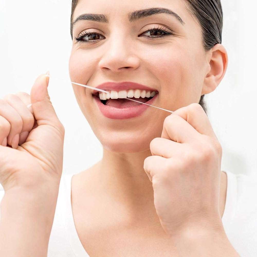 Desert Essence Tea Tree Oil Dental Floss - 50 Yards - Naturally Waxed w/ Beeswax - Thick Flossing No Shred Tape - On The Go - Removes Food Debris Buildup - Cruelty-Free Antiseptic - Image 9