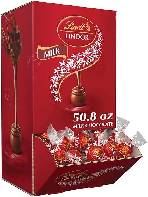 Lindt LINDOR Milk Chocolate Candy Truffles, Milk Chocolate with Smooth, Melting Truffle Center, 50.8 oz., 120 Count - Image 1