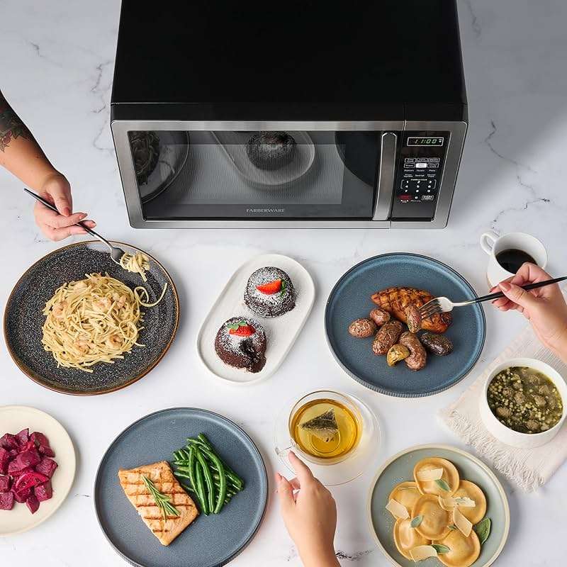 Farberware 1.1 Cu. Ft. Countertop Microwave Oven – 1000 Watts Power, Auto Cook Settings, Defrost, Easy Clean and Child Safety Lock - Stainless - Image 2