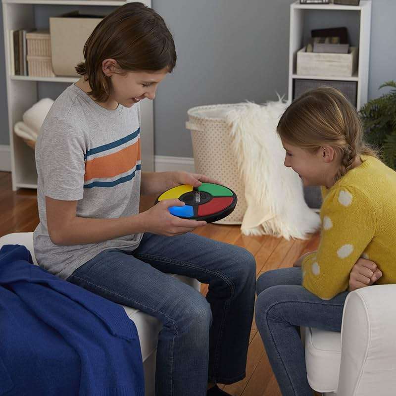 Hasbro Gaming Simon Handheld Electronic Memory Game With Lights and Sounds for Kids Ages 8 and Up - Image 2