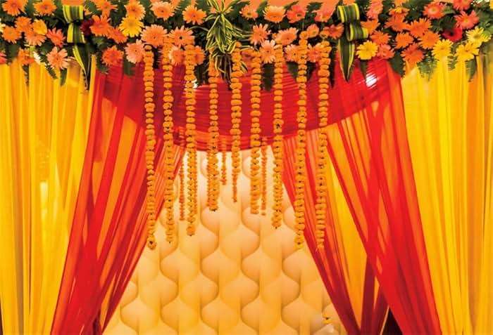 AOFOTO 7x5ft Indian Wedding Photo Backdrop Hindu India Traditional Festival Puja Pooja Diwali Background for Photography Yellow Red Curtains Marigold Flowers Party Decoration Banner Celebration Props - Image 1