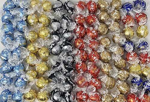 Lindt Lindor Assorted Flavored Truffles, Perfect for Parties Birthdays Engagements Weddings and More Occasions and Events, 100 Count - Image 1