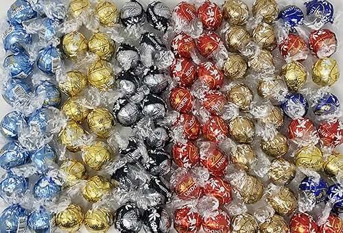 Lindt Lindor Assorted Flavored Truffles, Perfect for Parties Birthdays Engagements Weddings and More Occasions and Events, 100 Count - Product Image