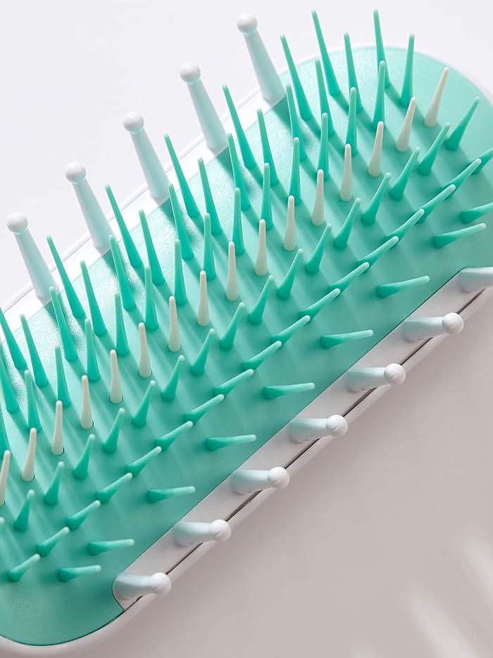 Frida Baby Detangling Hairbrush for Thick or Curly Hair, Toddler Hairbrush, Detangler Brush for Kids, Wide-Tooth Comb & Bristle Combo, Loosens Knots Without Tears or Breakage, Wet or Dry Use, Teal - Image 4