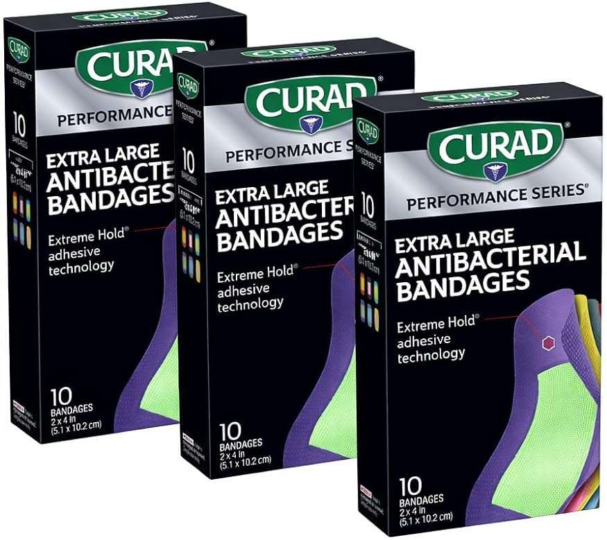 CURAD Performance Series IRONMAN Antibacterial Bandages, Extreme Hold Adhesive Technology, Extra Large Flexible Fabric Bandages for Cuts, Scrapes, & Burns, Assorted Colors, 2 x 4 inches, Pack of 3 - Image 1
