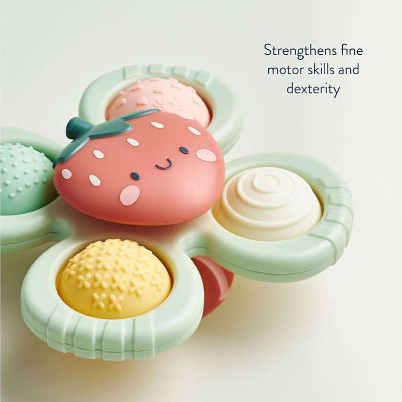 Itzy Ritzy Pop & Whirl – Fidget Spinner Travel & Bath Toy for Babies & Toddlers – Fidget w/Textured Silicone Popper to Develop Fine Motor Skills –Sticks to Highchairs, Tables, Tubs, More (Strawberry) - Image 6