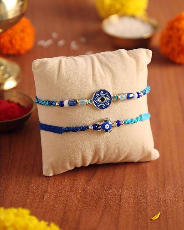 ARTISENIA Rakhi Set of 2 Rakhi for Brother with Raksha Bandhan Greeting Card | Roli Chawal Tika - Raksha Bandhan Evil Eye Rakhi for Brother & Bhabhi | Rakhi for Bhaiya | Turtle Rakhi for Brothers - Image 2